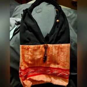 Cotton blend shoulder bag in peach, black. Brand unknown